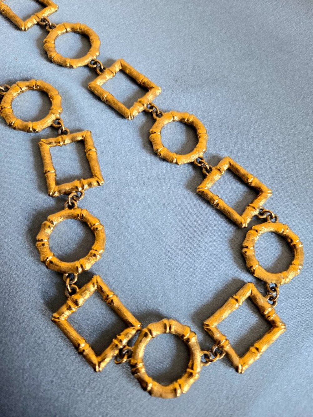 Vintage Monet Gold Tone long Chain Necklace with Geometric Design Links.